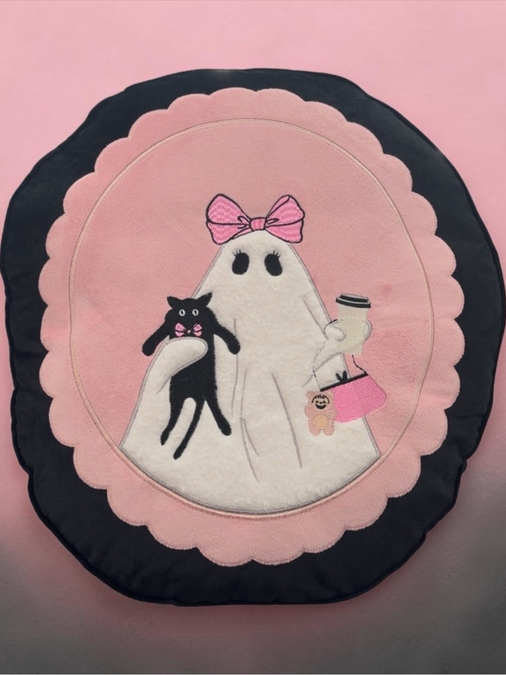 Pink Ghost Embroidered Round Accent Pillow with Black Trim